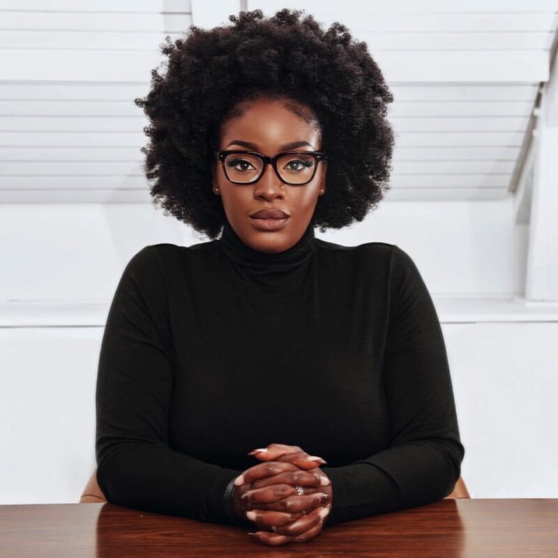 Lovette Jallow Black Swedish author speaking at diversity and inclusion event on natural hair workplace discrimination